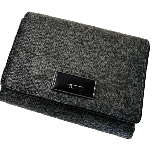 Tumi Crafted from leather, this refined and durable tri-fold wallet offers super